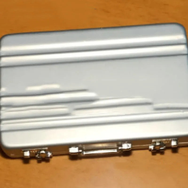 Aluminium alloy metal card holder in red colour showing dimensions of 100mm width 65mm height