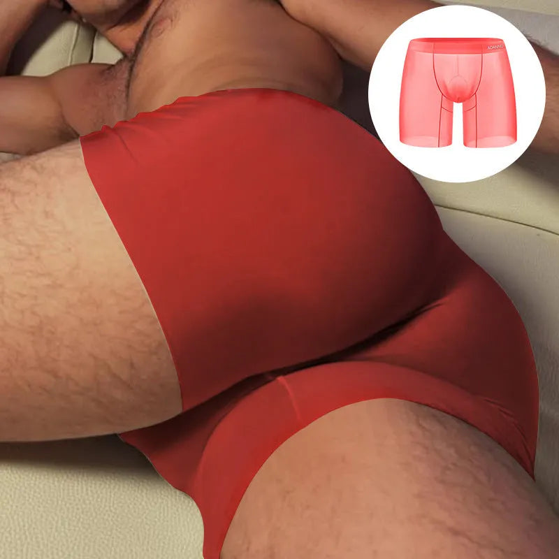 Men's seamless nylon boxer shorts in orange, pink, and red colours with low waist design