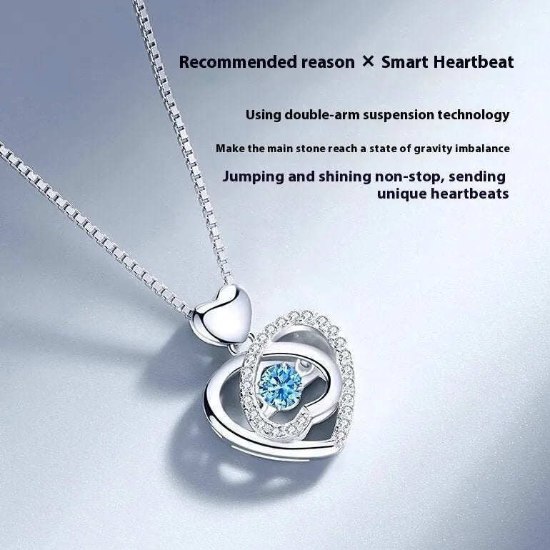 Blue diamond coloured beating heart necklace and bracelet set with gem inlaid pendant on electroplated copper.