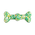 Natural rubber dog chew toy with camouflage pattern for large breed aggressive chewers in green, white, and yellow colours
