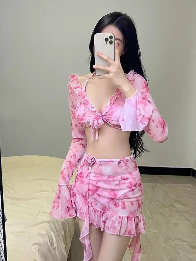 Women's cherry blossom pink floral bikini swimsuit set on a mannequin, showing front and back views.