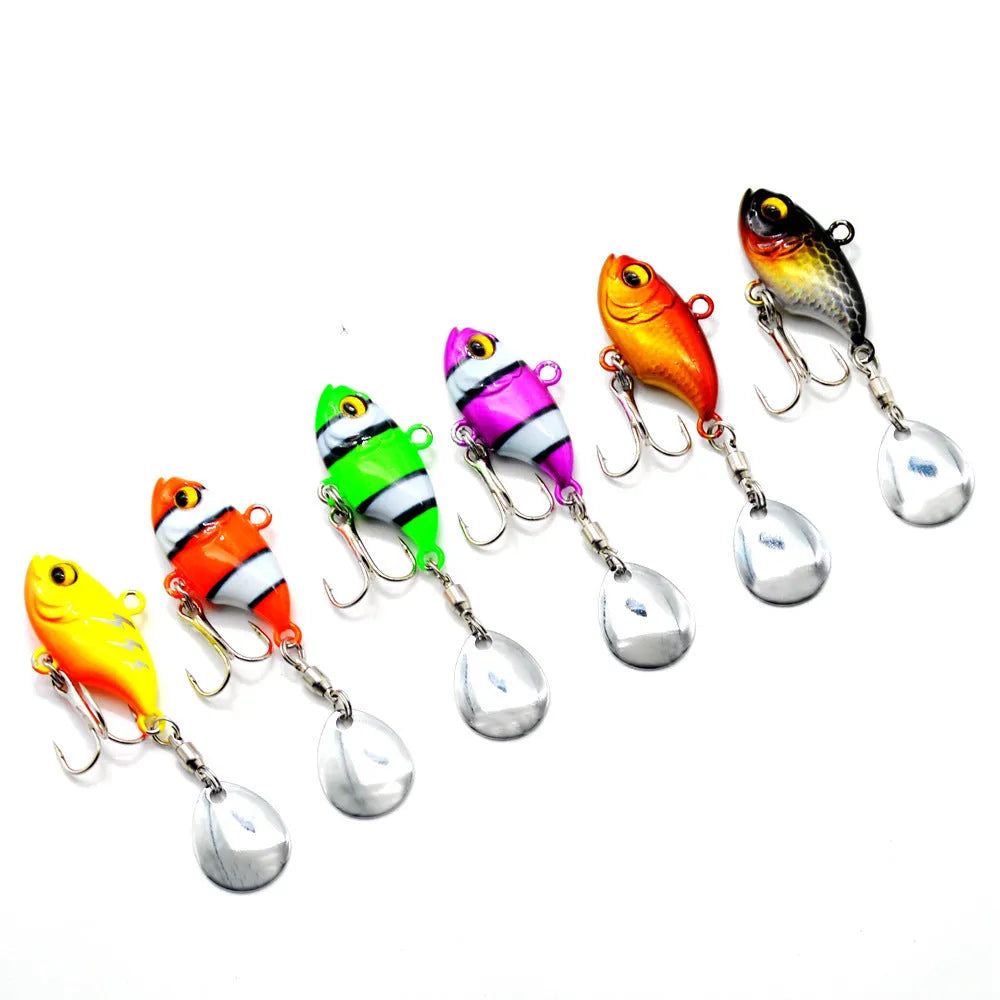 Metal fishing lure with rotating sequin in zebra stripe, black, purple, orange, green, and gold colour options.