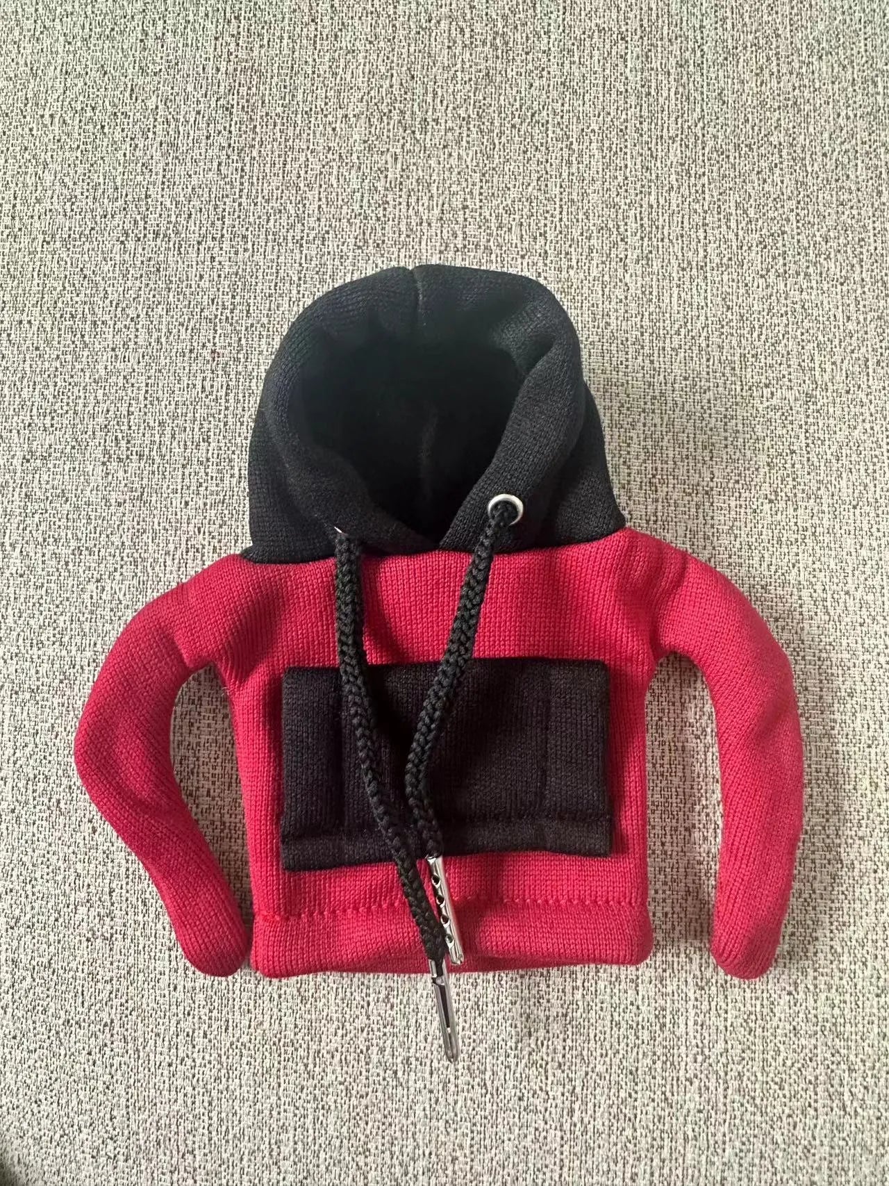 Polyester car gear lever hooded cover in red and white colour combination showing 12x13cm dimensions