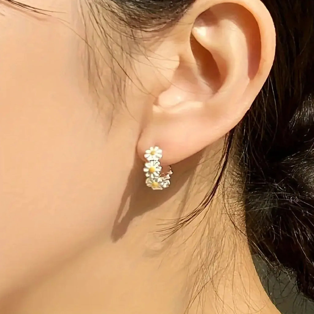 White daisy flower design earrings with electroplated finish on copper construction