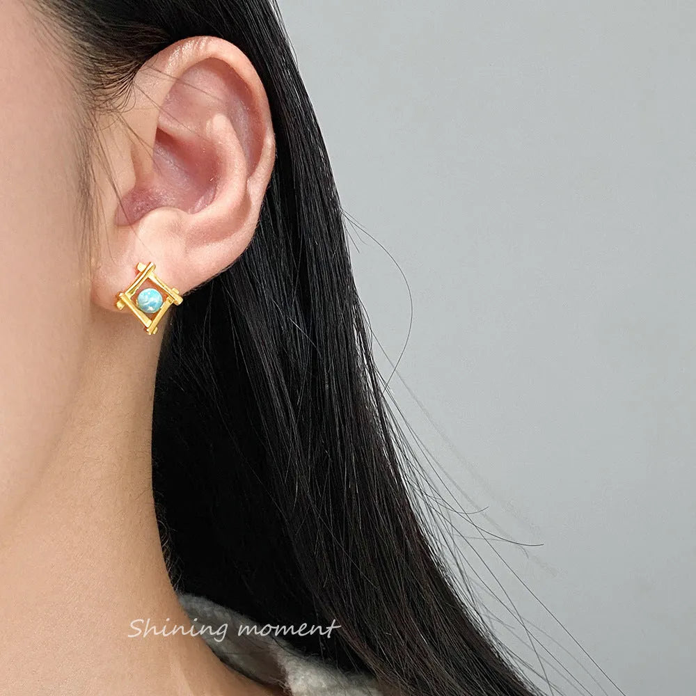 Geometric cross quadrangle stud earrings in sterling silver with gold or silver finish options