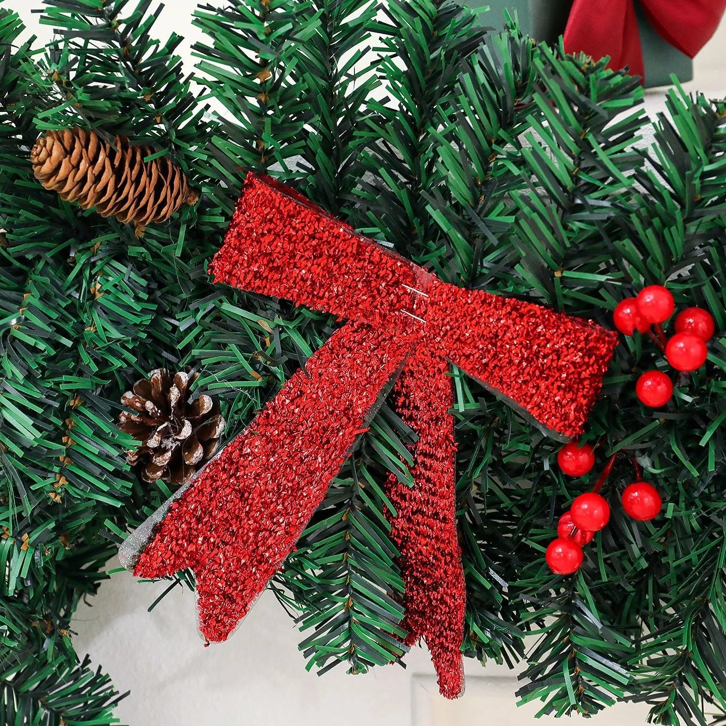 Christmas rattan decoration with pine cone bow and LED lighting options