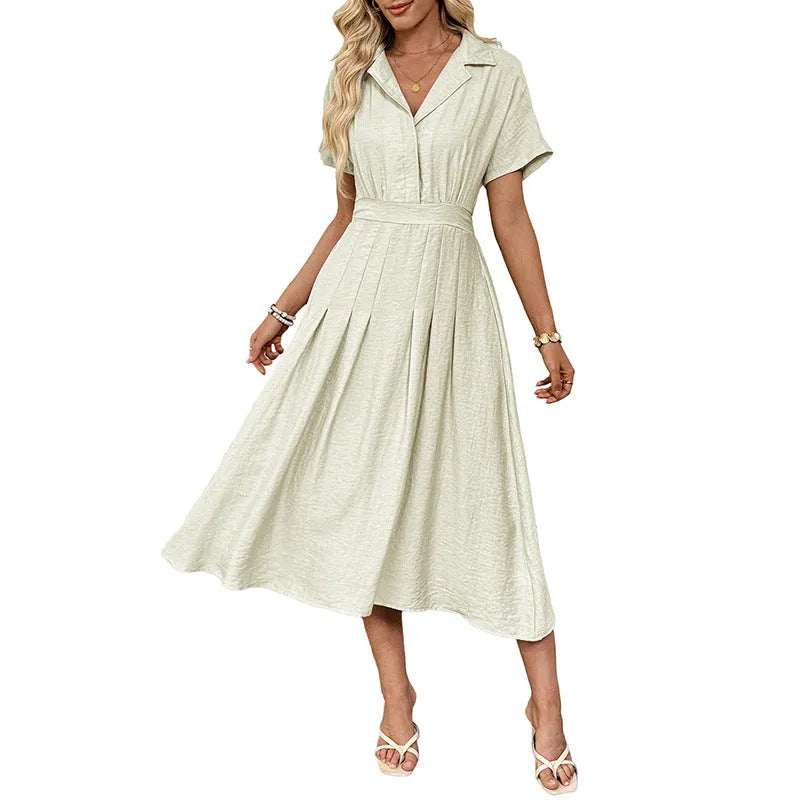 Light green women's shirt dress with lapel collar, waist tie, and side pockets