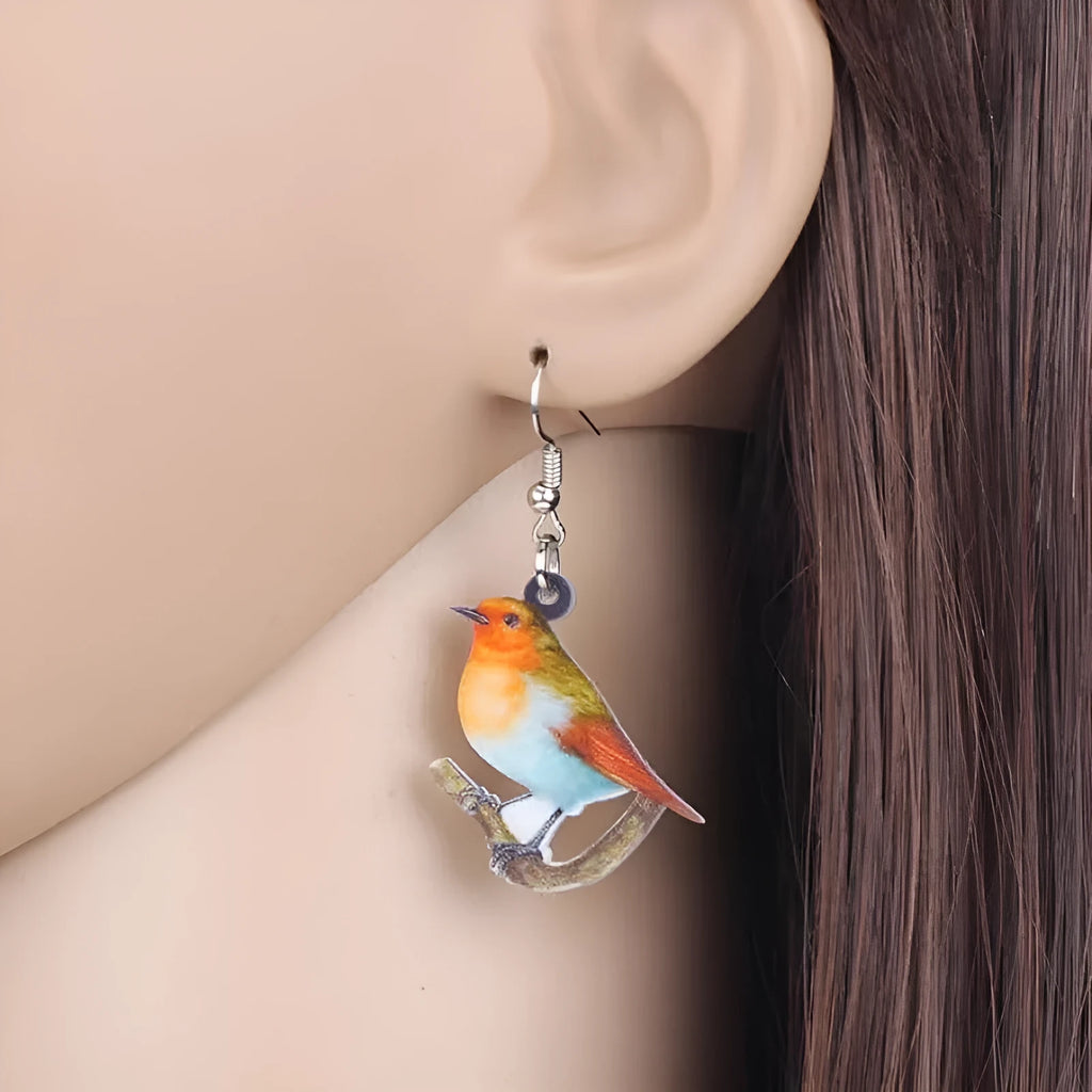 Blue titmouse design acrylic pendant earrings with geometric animal shape and snake decorative elements