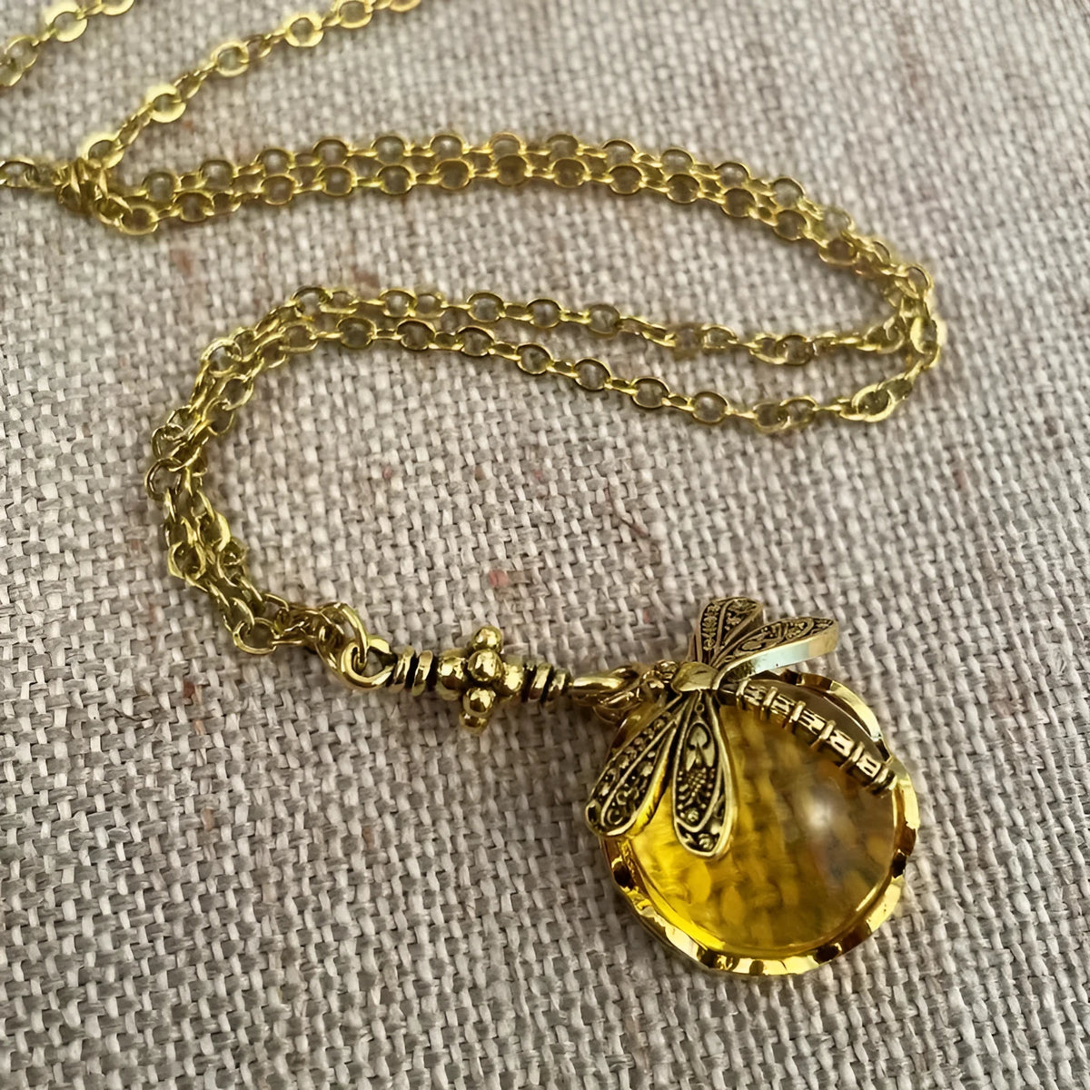 Yellow vintage bronze dragonfly pendant necklace on 925 silver adjustable chain with hand carved details