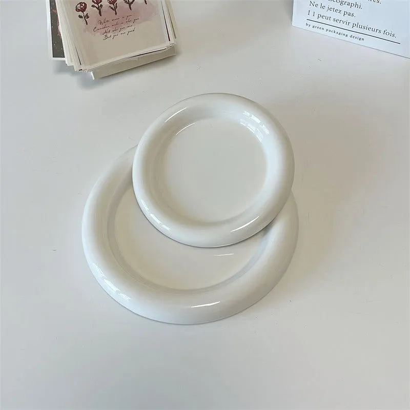 White ceramic plate with chubby toot bear illustration, porcelain potted tray.
