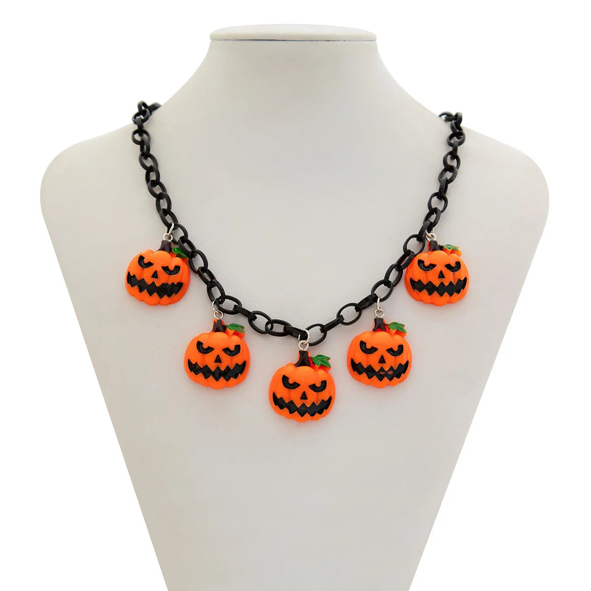 Cartoon pumpkin Halloween necklace with mixed colour acrylic pendant on a regular chain.