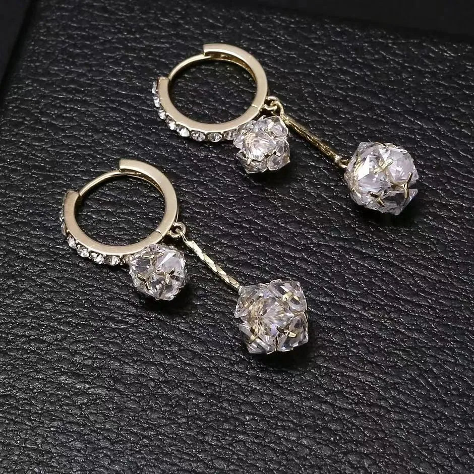 Silver women's earrings with balloon and rhinestone pendants in drop shape design.