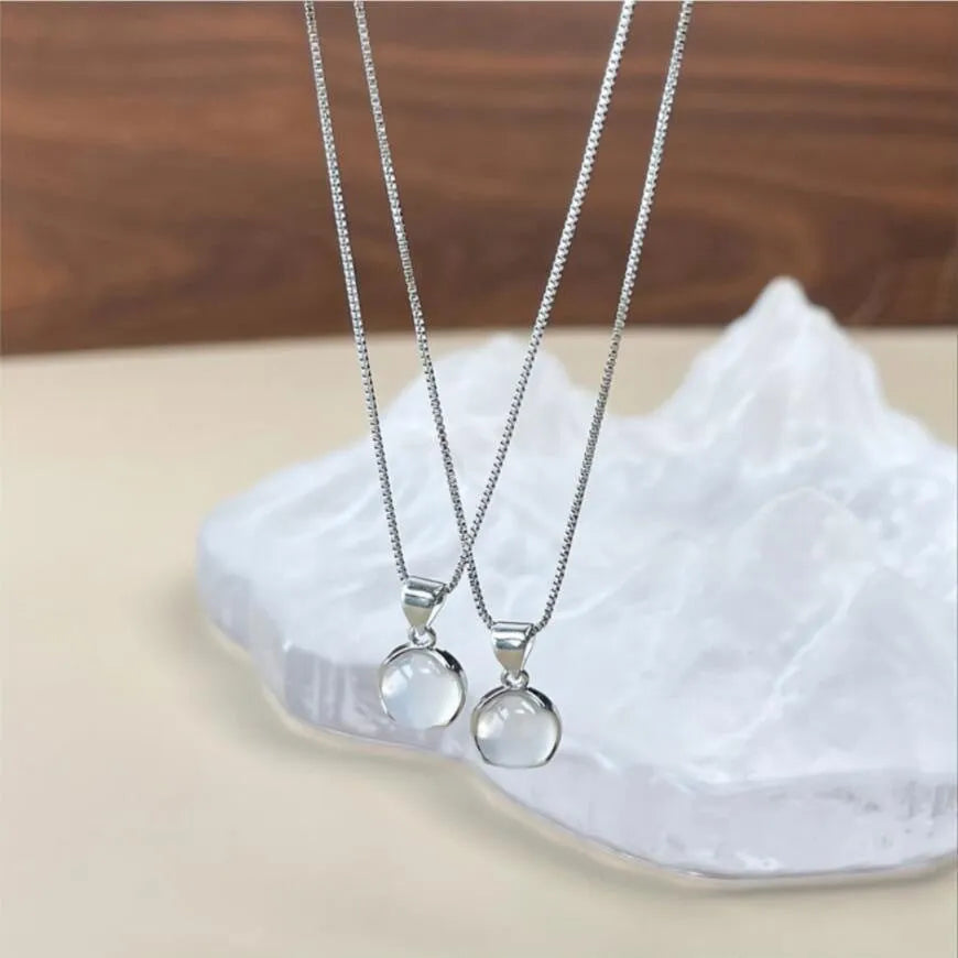 Korean-style women's oval pendant necklace with artificial crystal star on an adjustable box chain.
