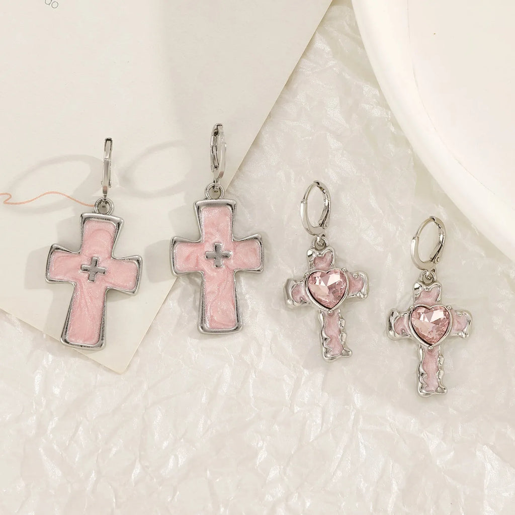 Women's alloy earrings with cross, heart, animal, and zodiac designs in white, black cat, and antique silver finishes
