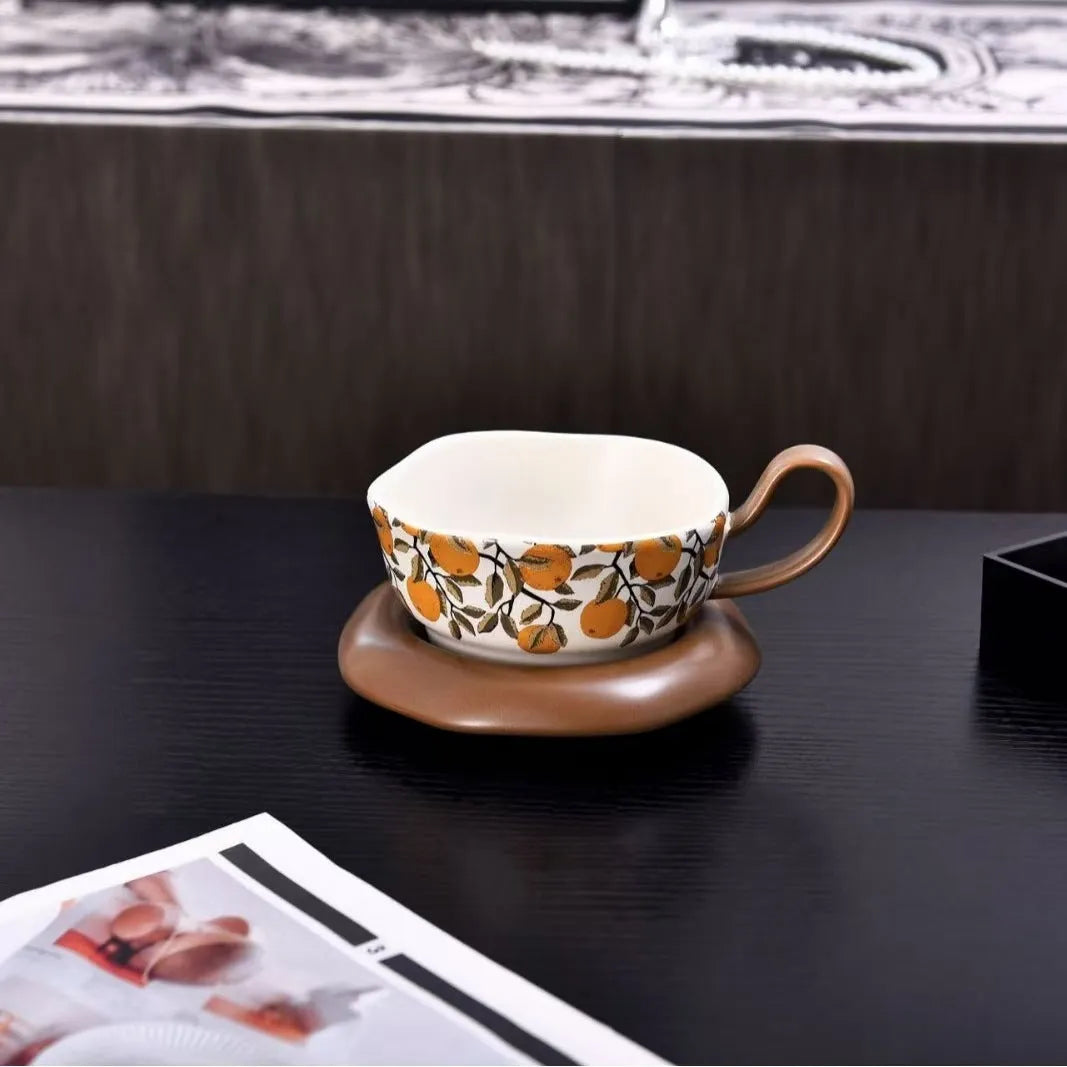 Antique style ceramic coffee cup and saucer set with 210ml capacity in black or orange retro design.