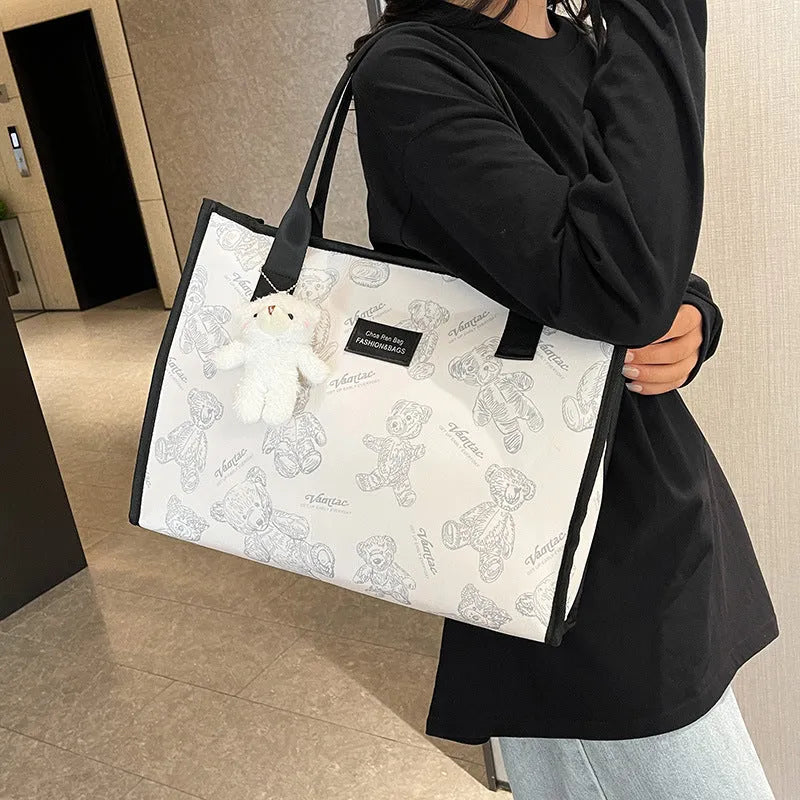 Women's canvas tote bag with diamond pattern in black or white colour options