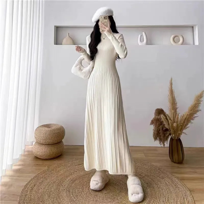 Women's acrylic blend high waist A-line midi dress in milky white colour showing waist-trimming silhouette