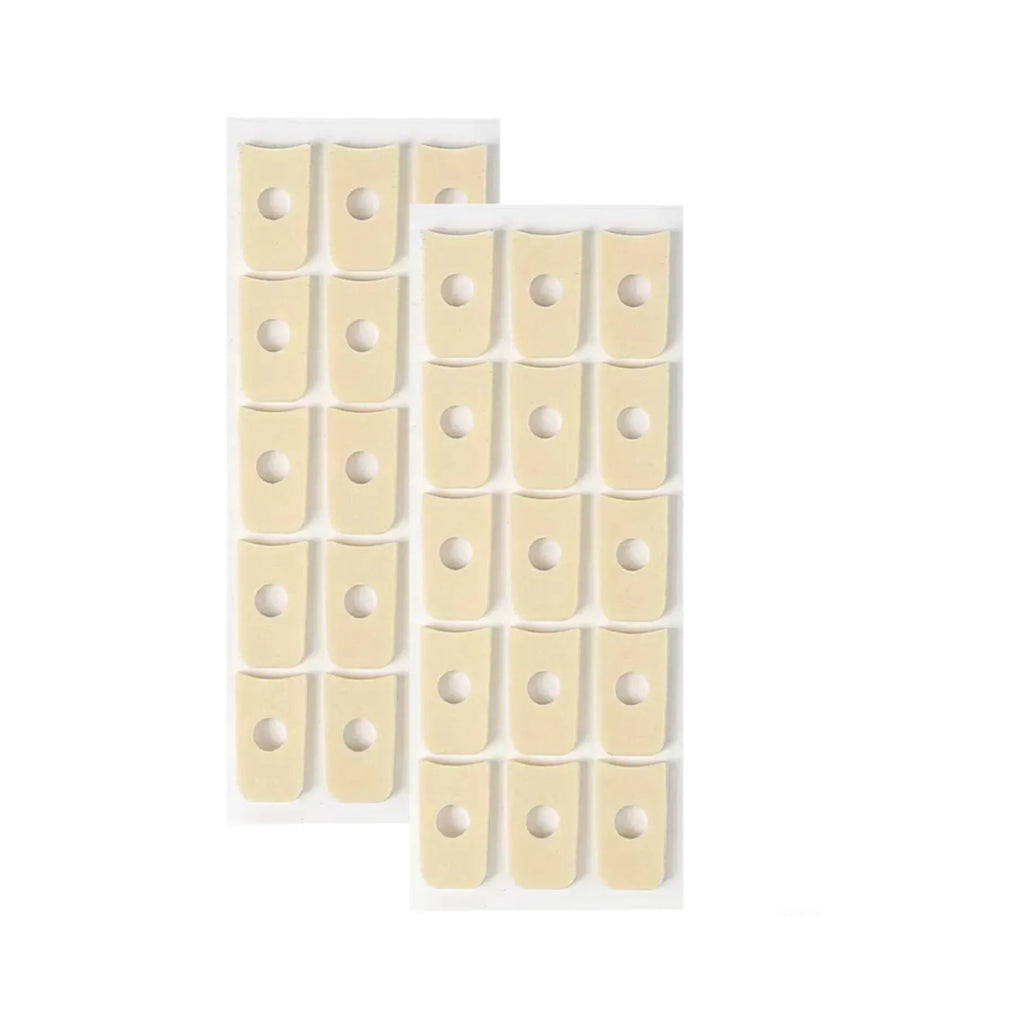 Multi-shape heel corn protectors pack showing large oval, small oval, U-shaped, and circular PU pads.