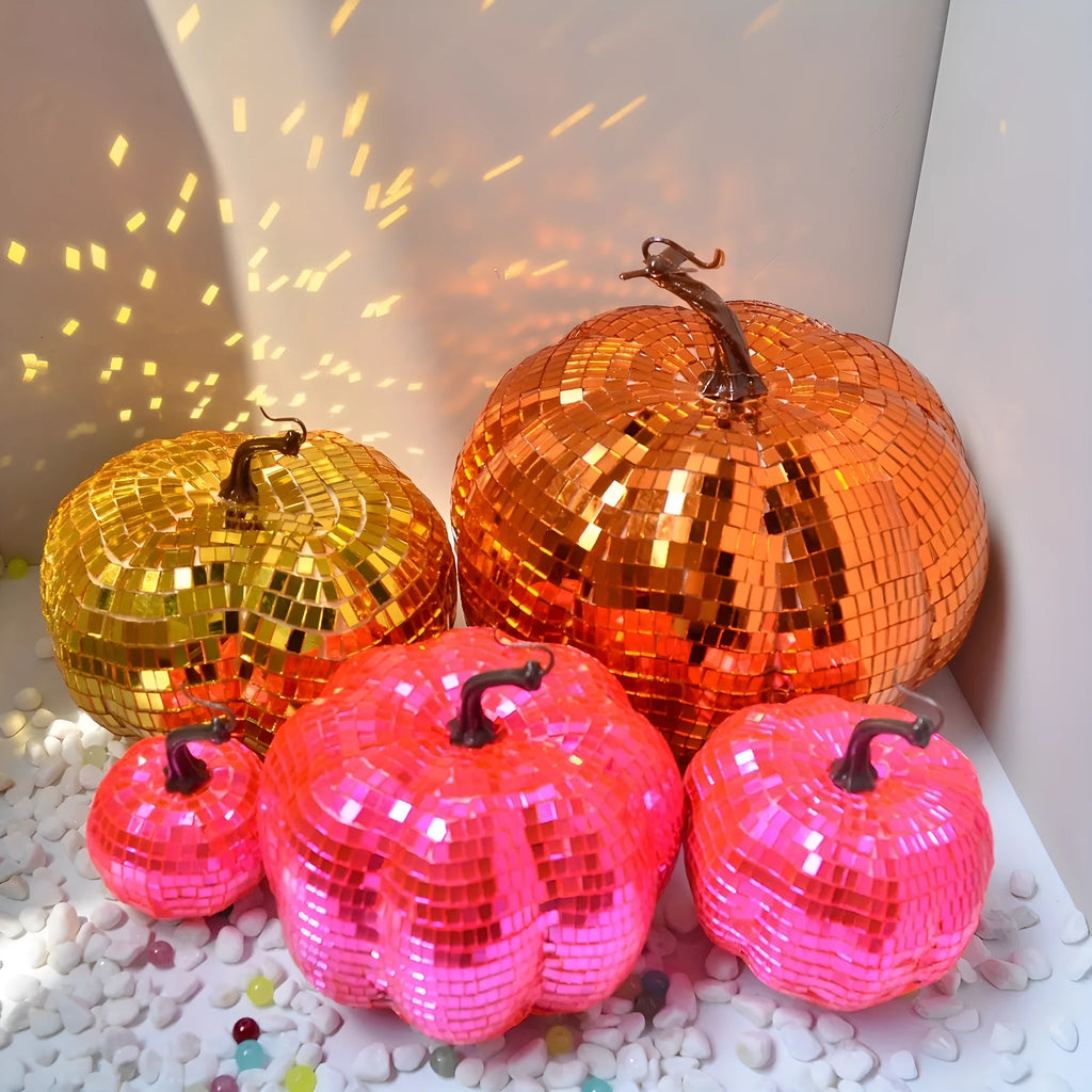 Handcrafted glass pumpkin ornament with embossed detail for Halloween and Christmas decoration.