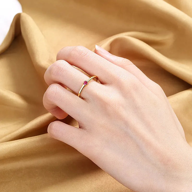 Women's copper circle ring with single diamond in blue, green, red or white colour