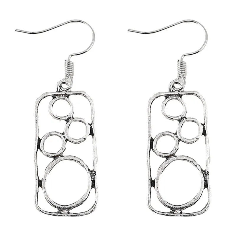 A pair of geometric round earrings with an irregular square shape in antique silver finish.