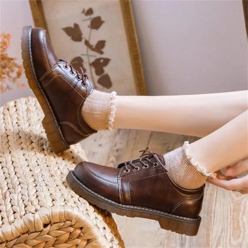 Women's preppy retro mary jane shoes in black with front lace-up design and low square heel
