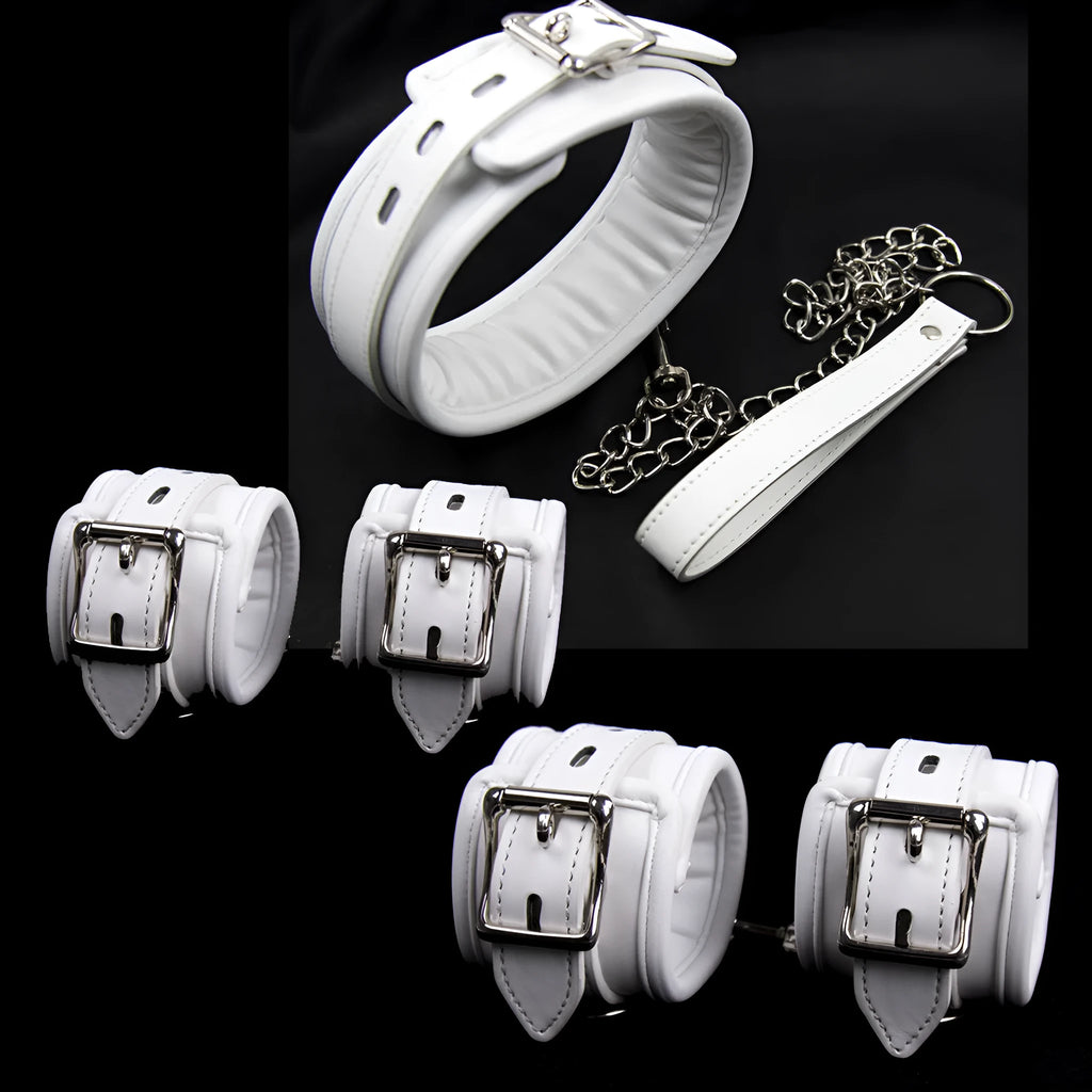 White PU sponge bondage restraint set showing handcuffs, foot cuffs, and a neck scarf.