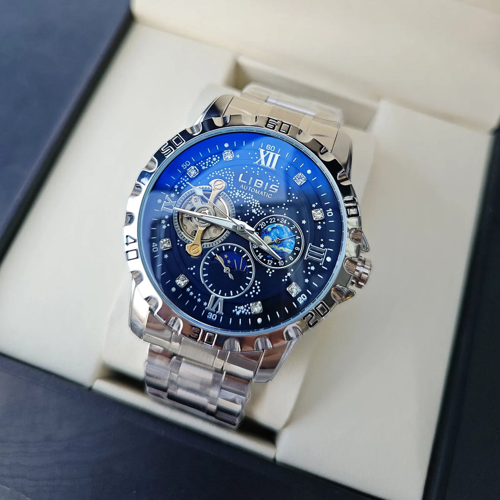 Men's silver automatic watch with black starry dial, luminous hands, and brown leather strap