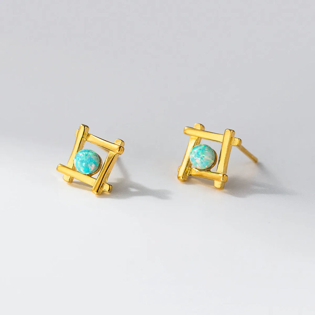 Geometric cross quadrangle stud earrings in sterling silver with gold or silver finish options