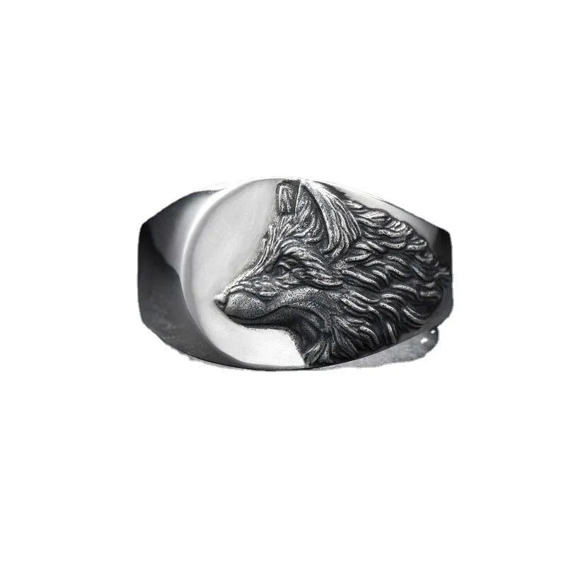 Men's silver alloy ring with geometric wolf design showing side profile