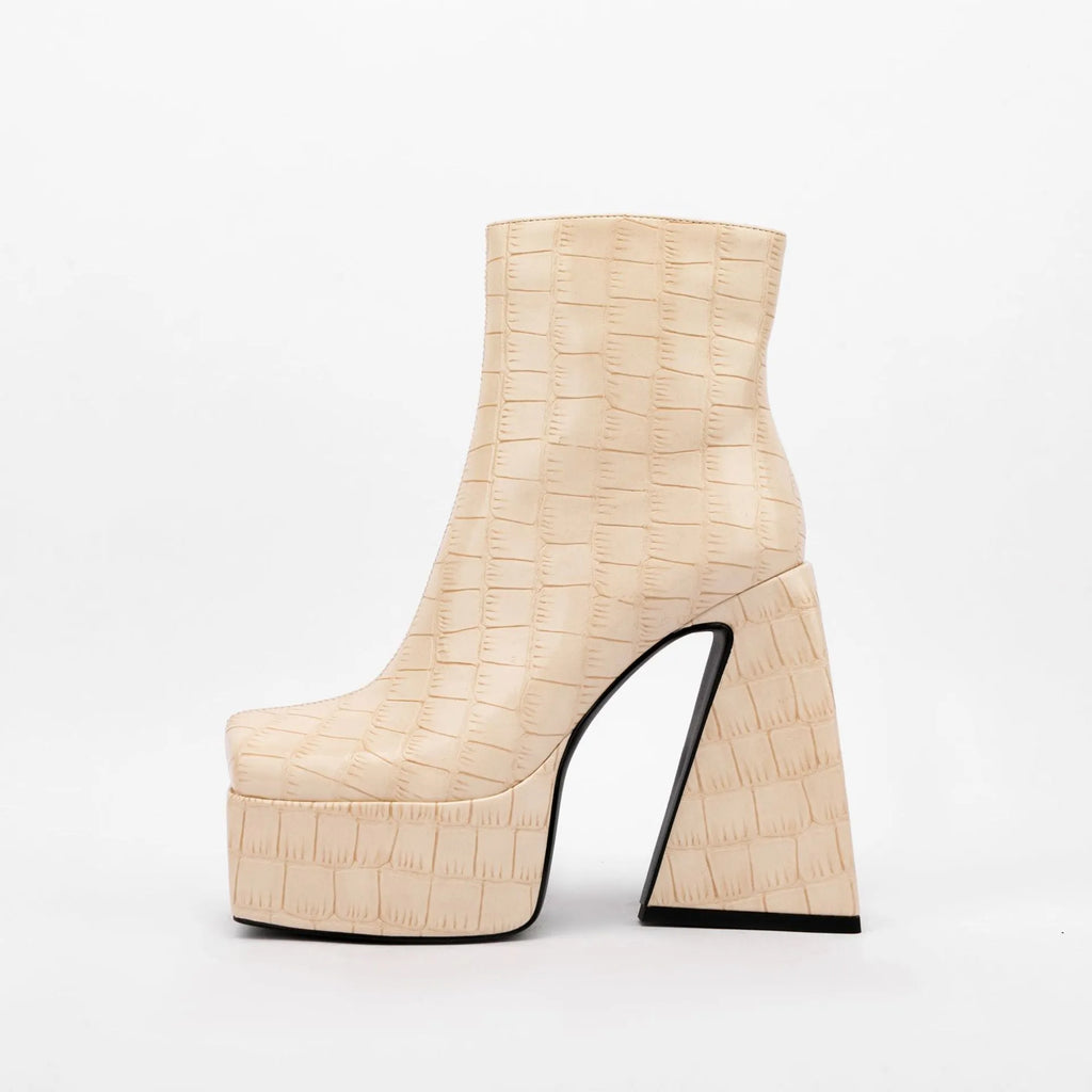 Women's solid-colour ankle boots with a super high heel, shown in beige, made from artificial PU material.