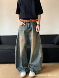 Men's retro blue distressed denim jeans with slim wide-leg cut and micro stretch fabric