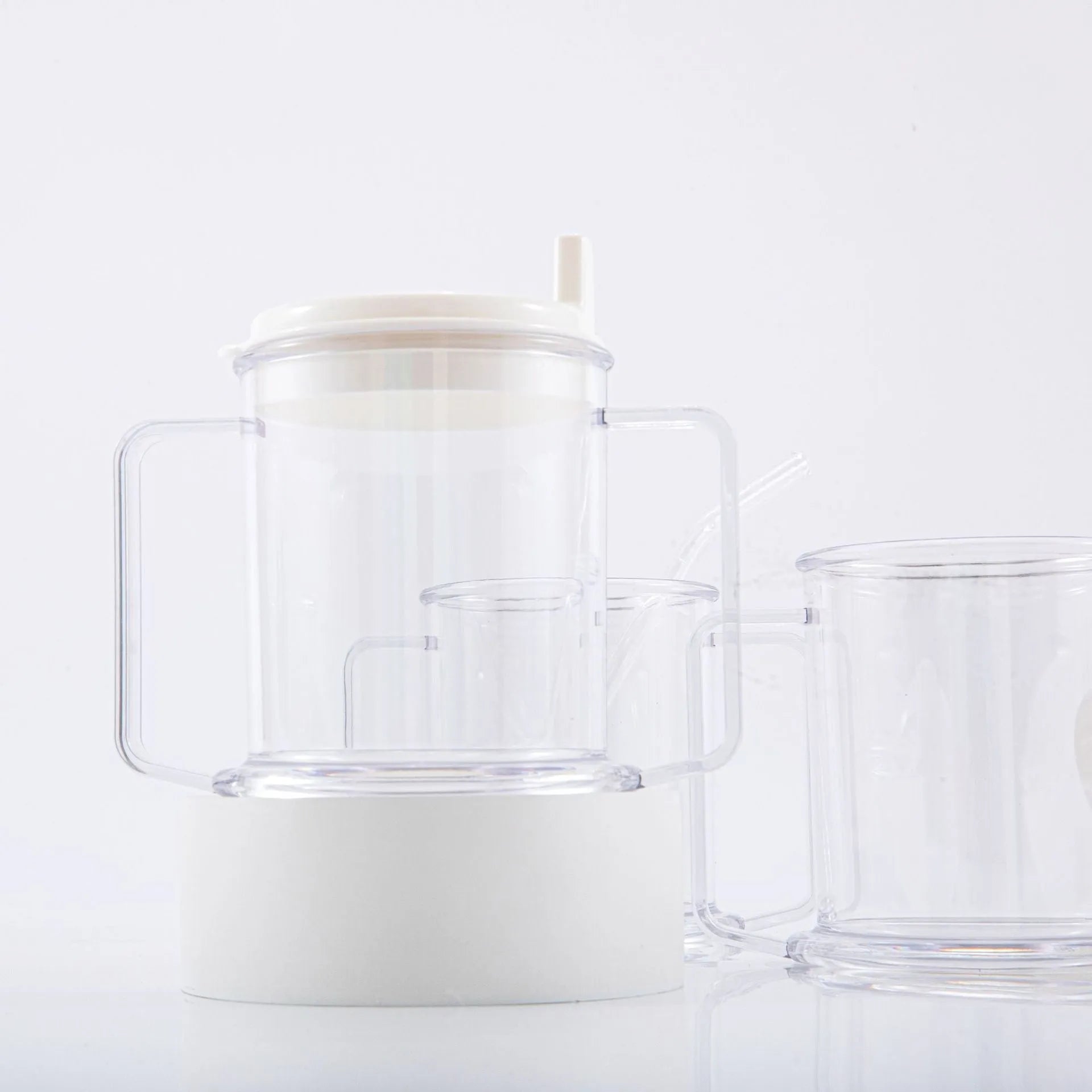 Transparent plastic drinking cup with spill-proof design showing 301-400ml capacity