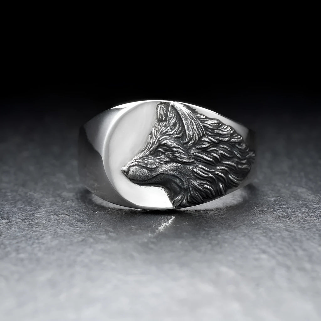 Men's silver alloy ring with geometric wolf design showing side profile