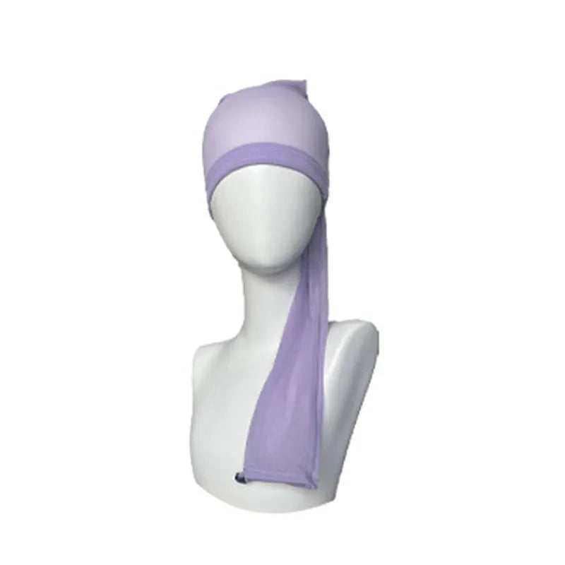 Mesh wig cap with elastic oversleeve design shown in various colour options including leopard print