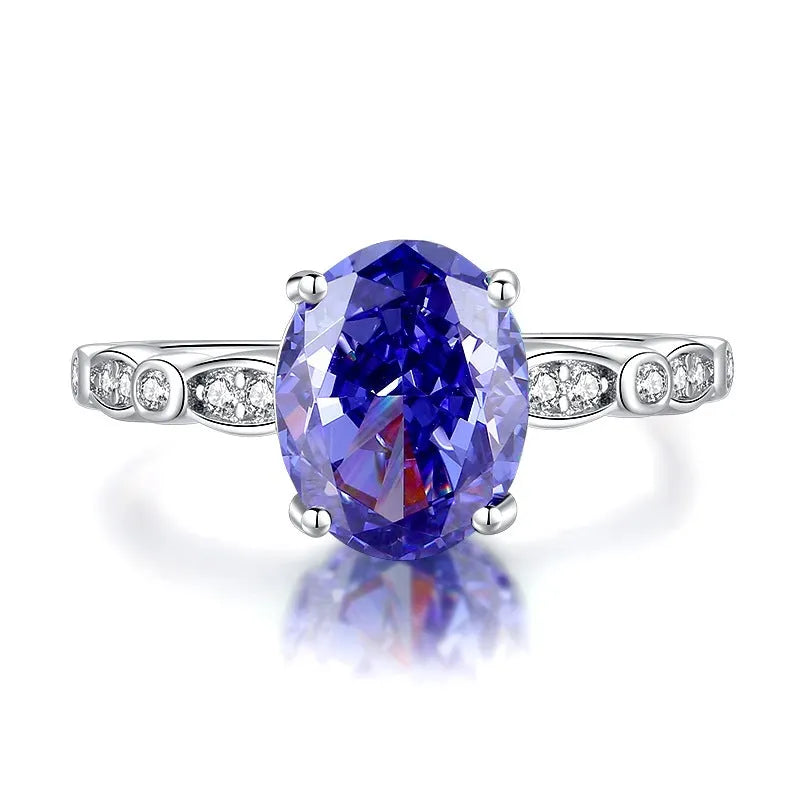 Heart-shaped sterling silver ring with a faceted ice flower cut zircon stone in a tan sang colour.