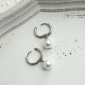 Geometric pearl drop earrings with alloy construction and titanium steel components