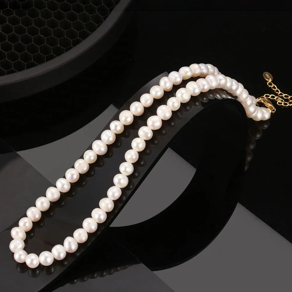 Women's adjustable freshwater pearl necklace with sterling silver chain and 6-7mm natural pearls