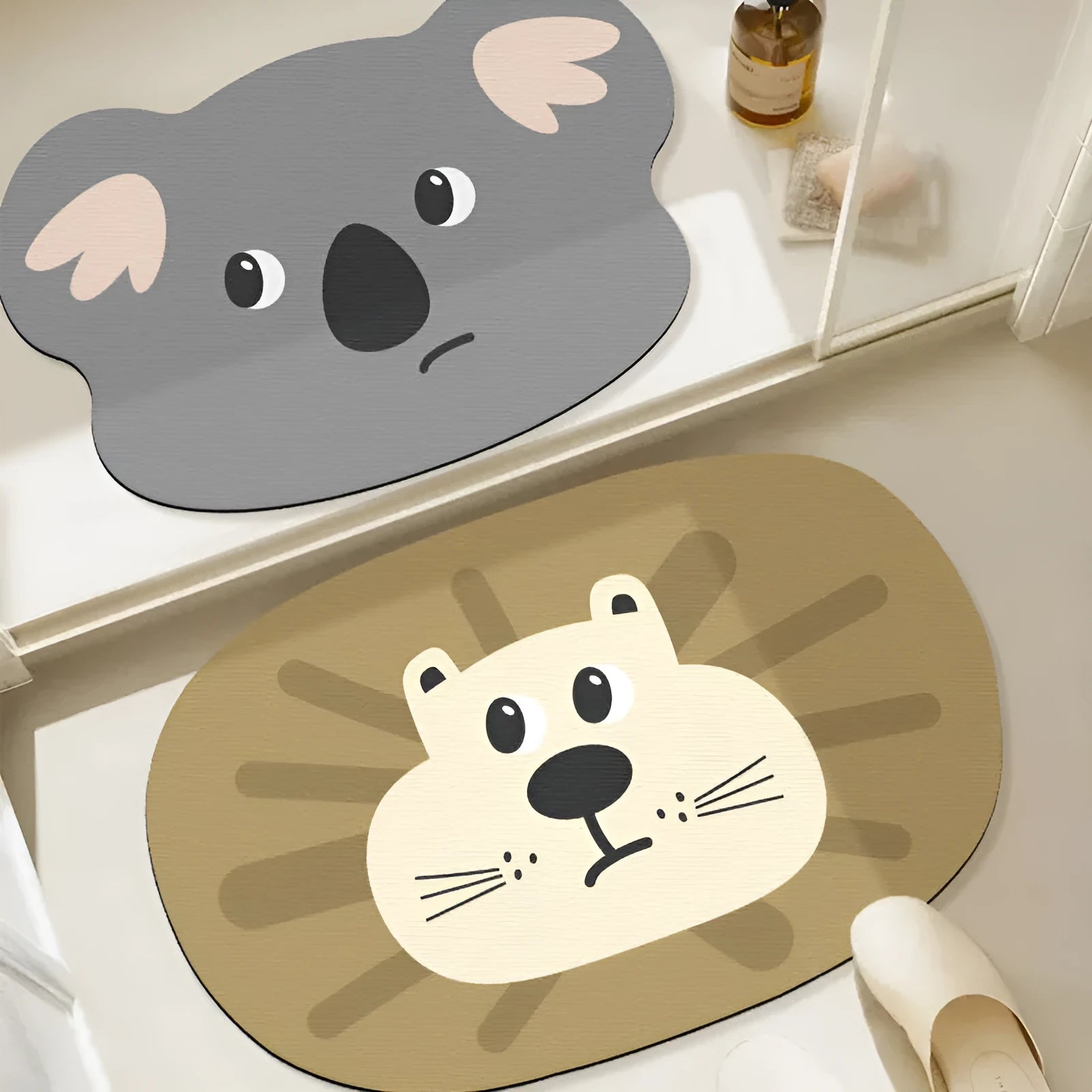 Cartoon animal diatomaceous earth bathroom mat in alien shape on a bathroom floor.
