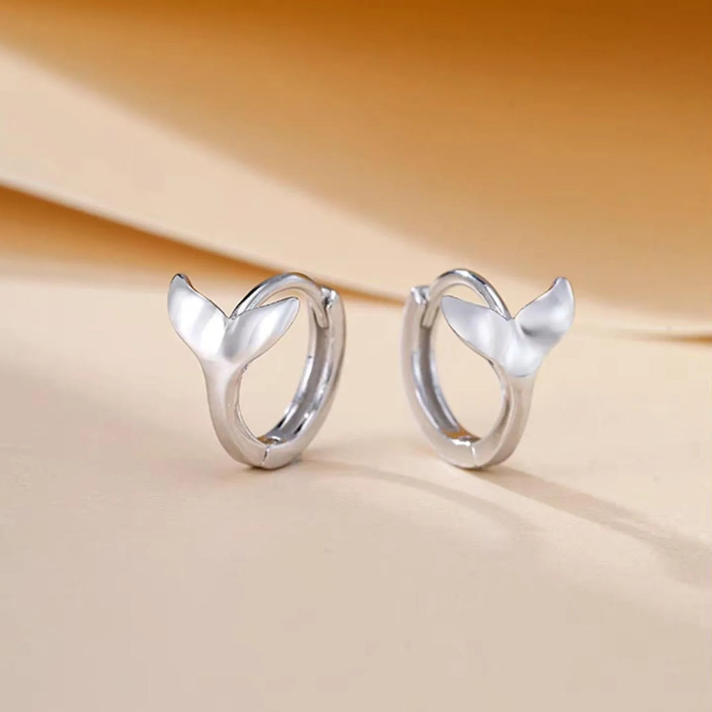 Women's fishtail design earrings in electroplated copper with white gold or yellow gold finish