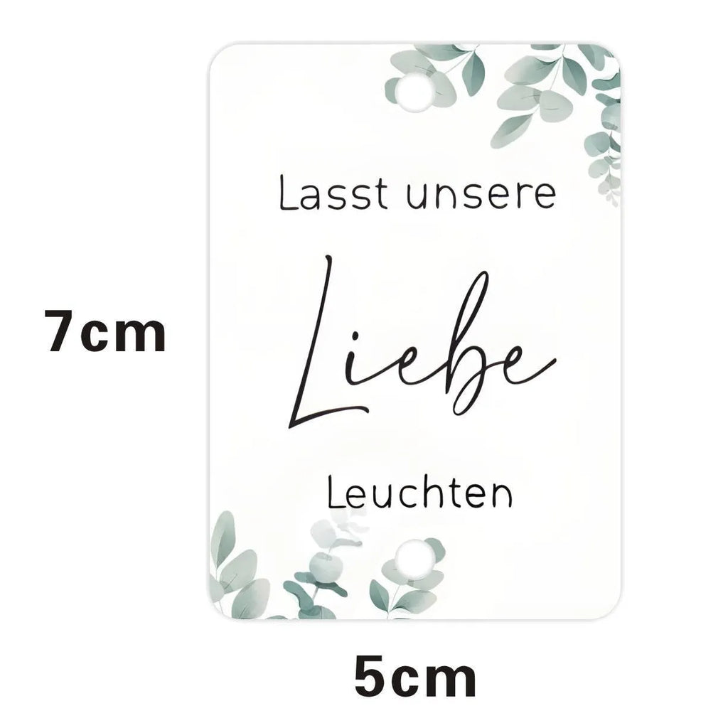 Pack of 50 white decorative paper labels with G45 I Make Love Sparkling design for weddings.