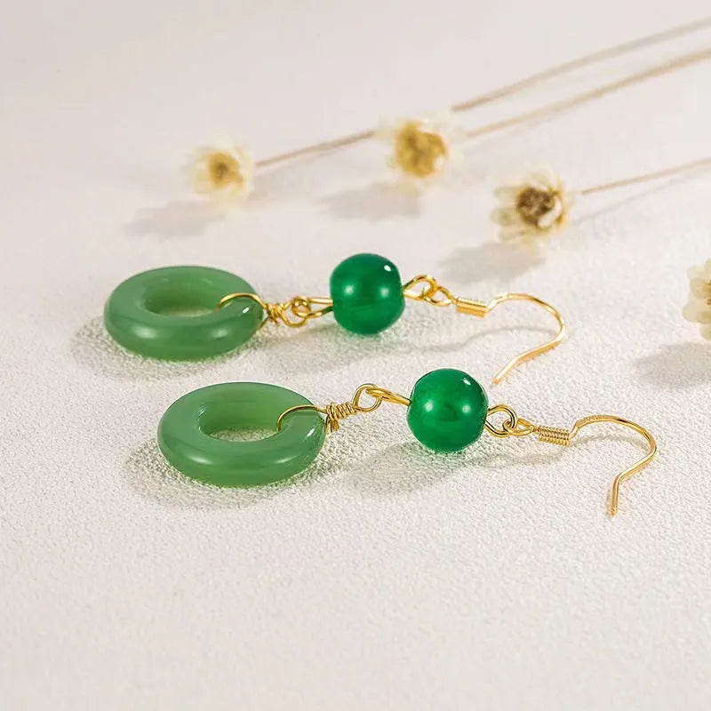 Green jade design peace buckle earrings with 14K gold plating and geometric ring details for Hanfu style