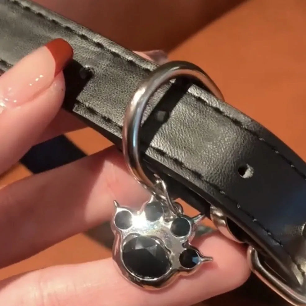 Black adjustable leather choker collar with a choice of cat paw, bone, or LD style charms.