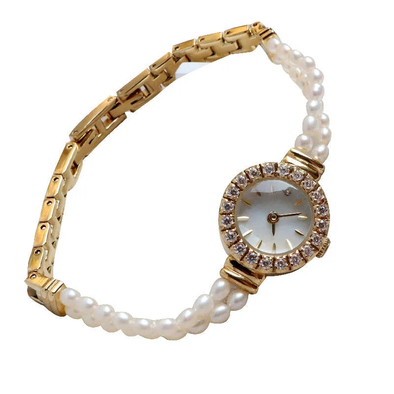 Women's light gold bracelet watch with freshwater pearls and 18mm round dial