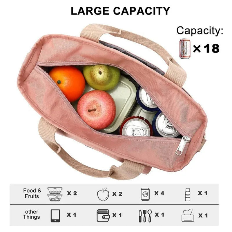 Cube-shaped Oxford cloth picnic bag with a removable shoulder strap and side pocket in pink.
