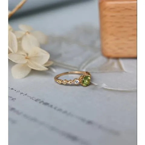 Copper geometric ring with quadrilateral design and imitation peridot centre in Japanese retro style