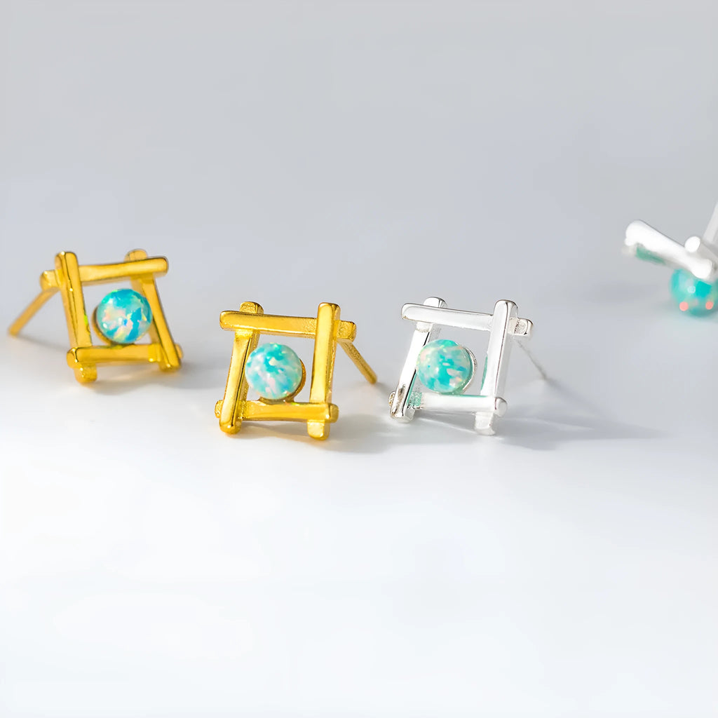 Geometric cross quadrangle stud earrings in sterling silver with gold or silver finish options