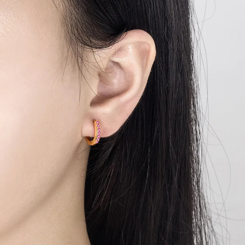 Gold-tone copper geometric hoop earrings with inlaid zircon in black, red, or green, one pair