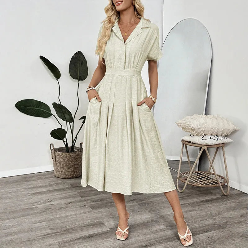 Light green women's shirt dress with lapel collar, waist tie, and side pockets