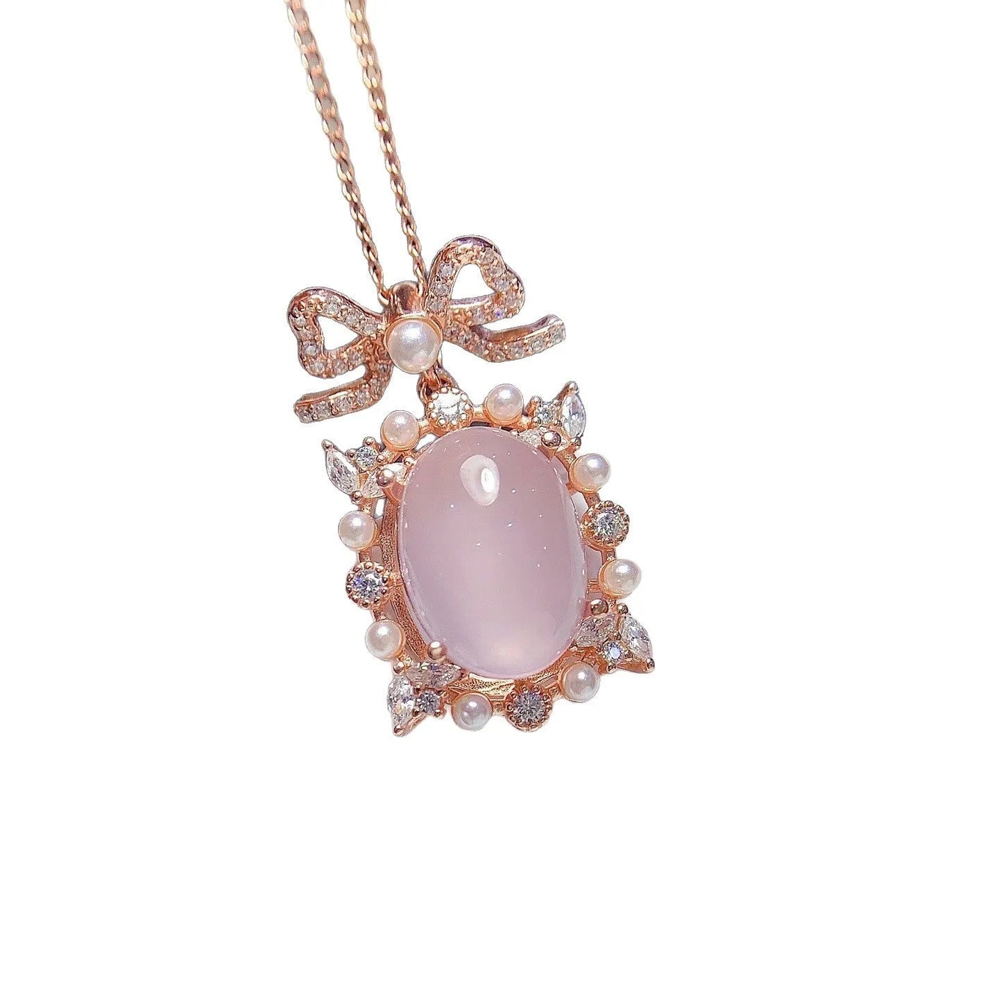 Geometric rose quartz pendant necklace with rose gold plated silver mounting on alloy chain
